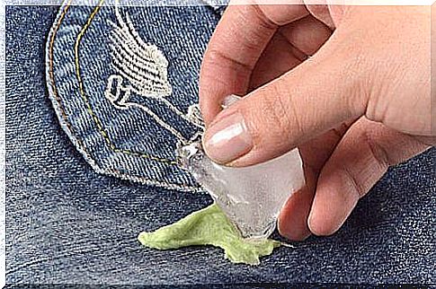 Remove a gum from clothing with ice