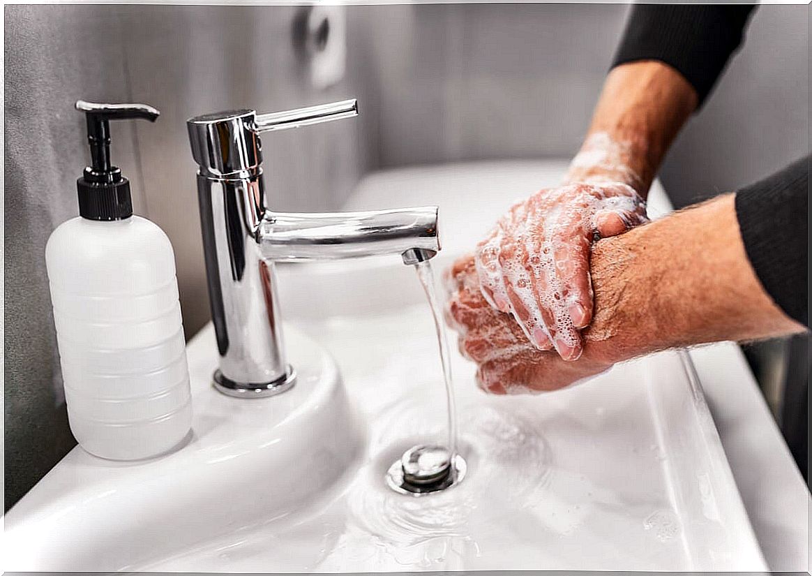 Hand washing with soap.