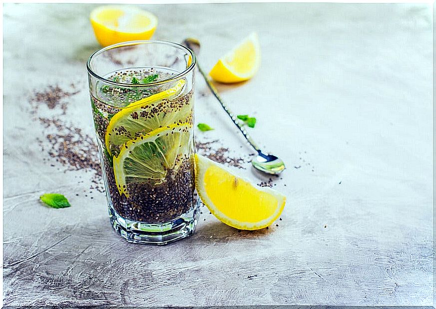 Glass of lemon juice with chia seeds.