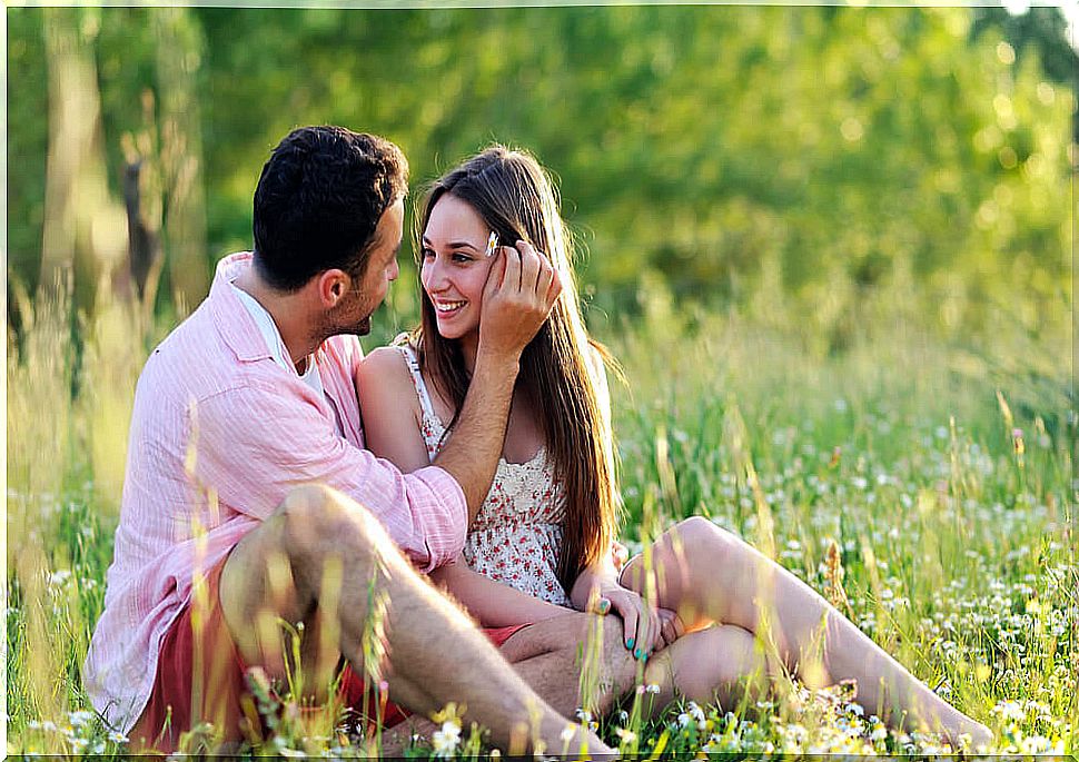 Couple flirting in nature.